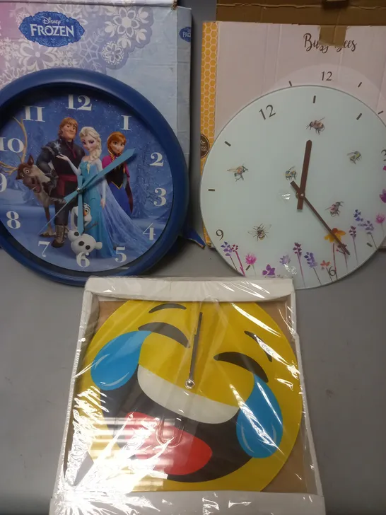 LOT OF 3 ASSORTED WALL CLOCKS INCLUDE SMILEY, FROZEN AND BEE THEMES