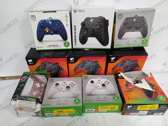 ASSORTMENT OF BOXED XBOX CONTROLLERS INCLUDING FOUR PDP ATOMIC CARBON WIRED CONTROLLERS