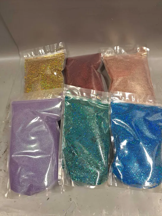 BOX OF APPROXIMATELY 15 SEALED ASSORTED GLITTER POUCHES TO INCLUDE - BLUE - PURPLE - GOLD - ETC - COLLECTION ONLY