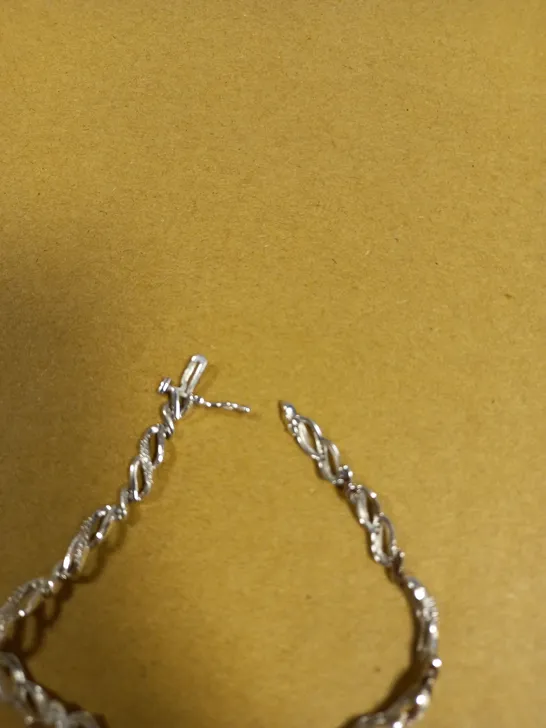 WHITE GOLD 20 POINT DIAMOND INFINITY BRACELET 