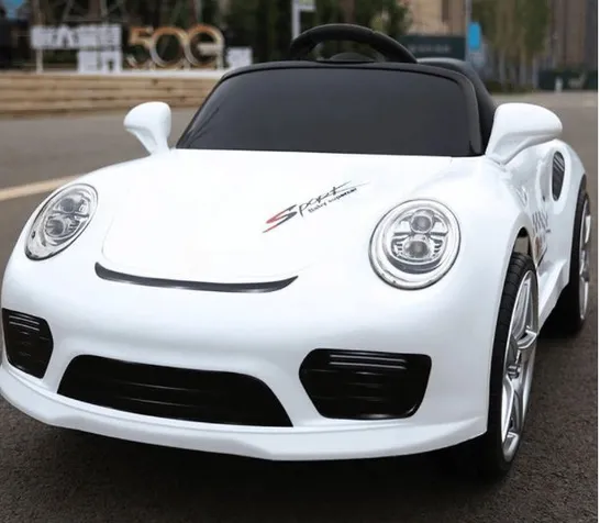 BRAND NEW BOXED KIDS PORSCHE STYLED 12V RIDE ON CAR WHITE