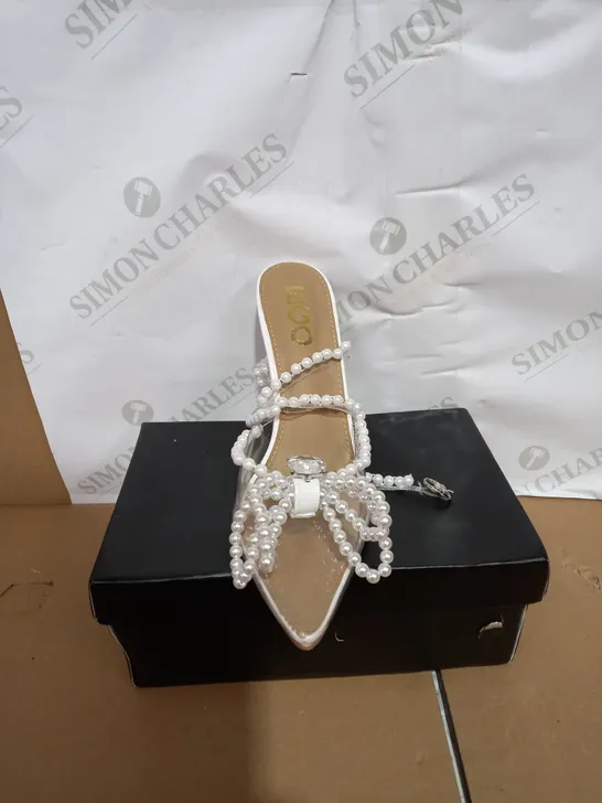 PAIR OF BOXED PEARLLE WHITE HIGH HEELS SIZE 6