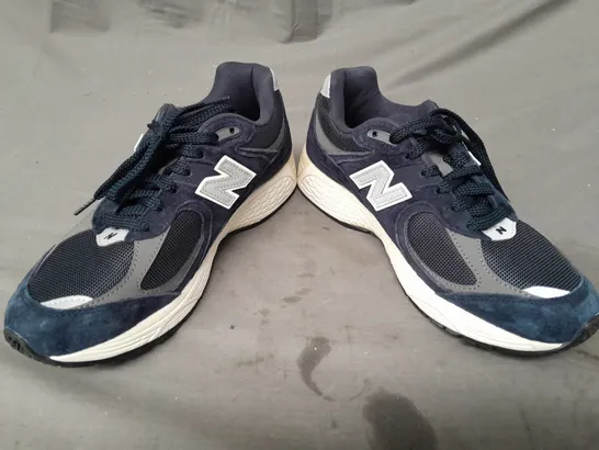 PAIR OF NEW BALANCE 2002R SHOES IN NAVY UK SIZE 7.5