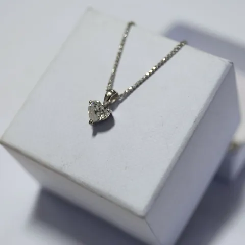 18CT WHITE GOLD SOLITIARE PENDANT ON CHAIN, SET WITH A HEART SHAPED DIAMOND WEIGHING +0.75CT