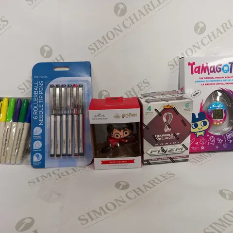 BOX OF APPROX 20 ASSORTED ITEMS TO INCLUDE - TAMAGOTCHI WATCH PET  - HALLMARK HARRY POTTER - WHSMITH ROLLER BALL PENS ECT