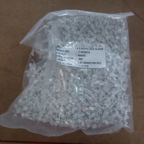 BOX OF APPROXIMATELY 10000 WHITE #3 AUTO LOCK SLIDERS