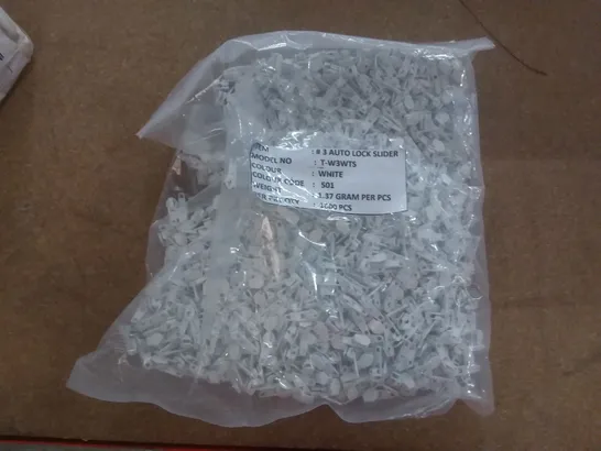 BOX OF APPROXIMATELY 10000 WHITE #3 AUTO LOCK SLIDERS