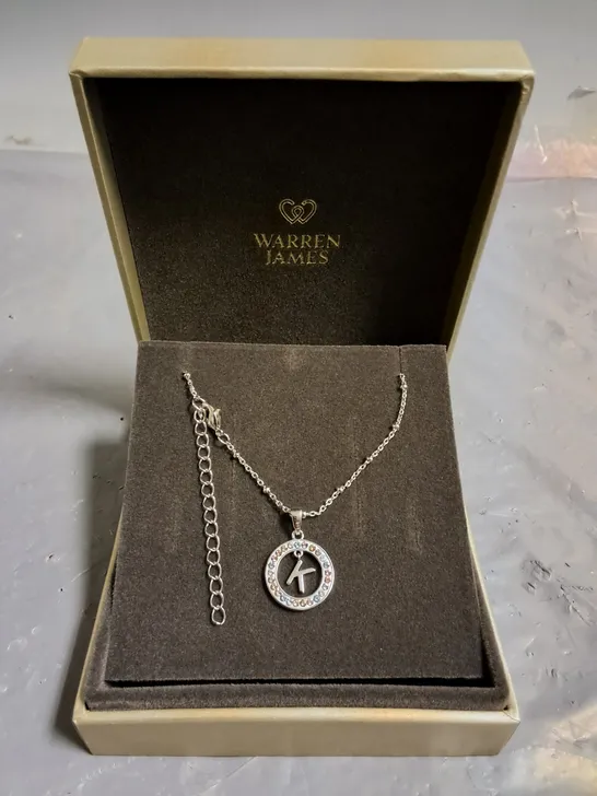 WARREN JAMES CIRCLE SURROUNDED K NECKLACE 