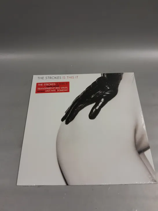 SEALED THE STROKES IS THIS IT VINYL LIMITED EDITION TRANSPARENT RED VINYL 