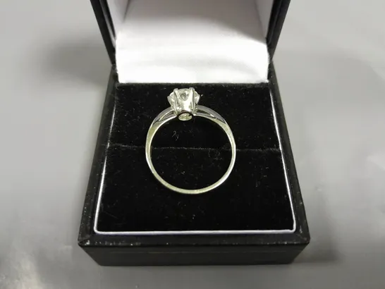 18CT GOLD SOLITAIRE RING SET WITH A NATURAL DIAMOND WEIGHING +-1.23CT