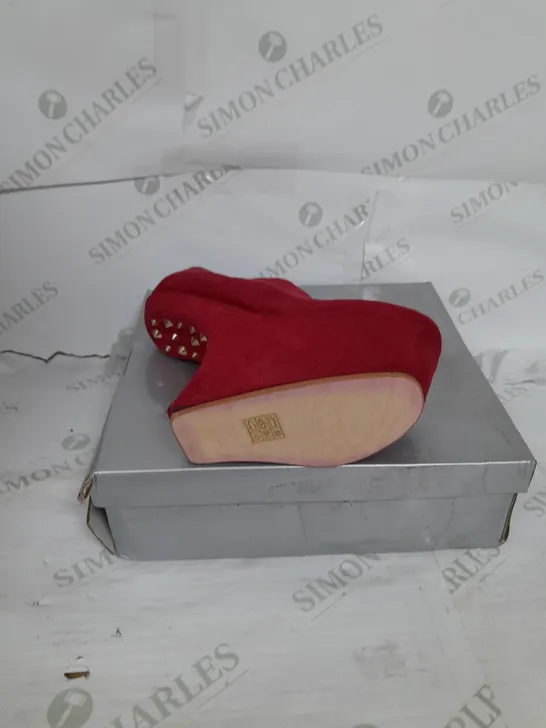 BOXED PAIR OF CASSANDRA PLATFORM SHOE IN RED SUEDE WITH GOLD SPIKES SIZE 6