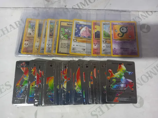 LOT OF ASSORTED POKÉMON TRADING CARDS AND SILVER EFFECT CARDS