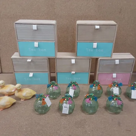 BOX TO CONTAIN AN ASSORTMENT OF HOUSEHOLD PRODUCTS INCLUDING; TEA BOXES, DECORATIVE DUCKS, CANDLE HOLDERS