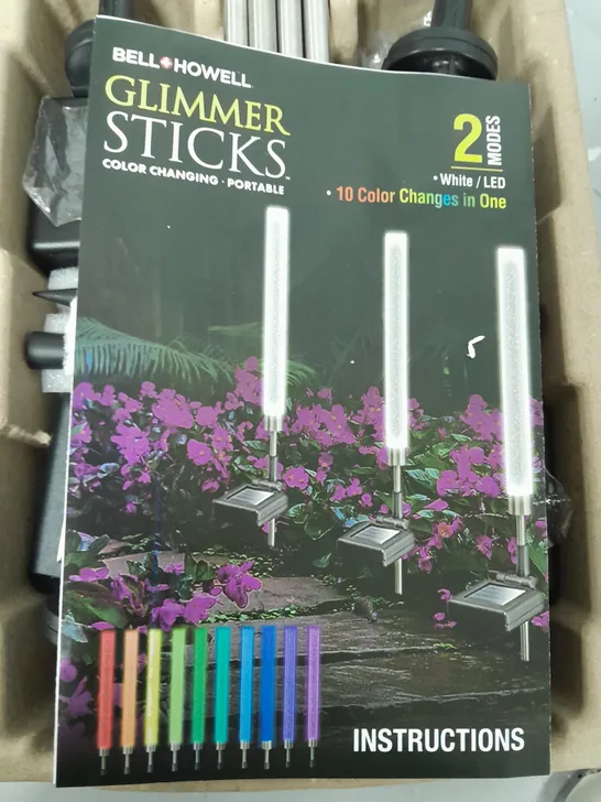 BOXED BELL & HOWELL GLIMMER STICKS SET OF 4 SOLAR PATHWAY LIGHTS