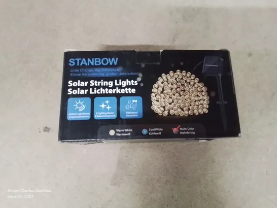 A BOX OF SOLAR POWERED STRING LIGHTS 