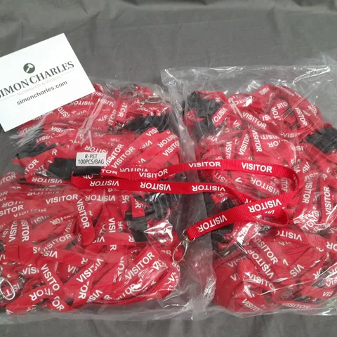 LOT OF APPROXIMATELY 900 RED VISITOR BRANDED LANYARDS