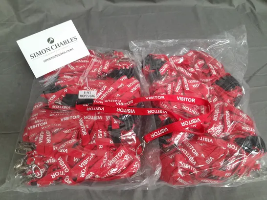 LOT OF APPROXIMATELY 900 RED VISITOR BRANDED LANYARDS