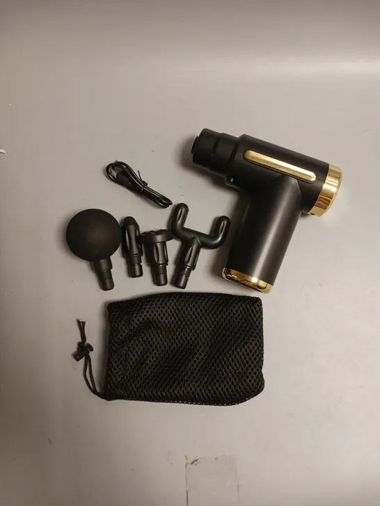 COTSCO MASSAGE GUN IN BLACK WITH GOLD ACCENTS INCLUDES 4 DIFFERENT HEADS AN CHARGING CABLE