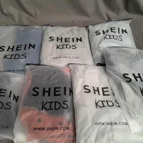 LOT OF APPROXIMATELY 20 BAGGED SHEIN KIDS CLOTHING ITEMS - VARIOUS SIZES