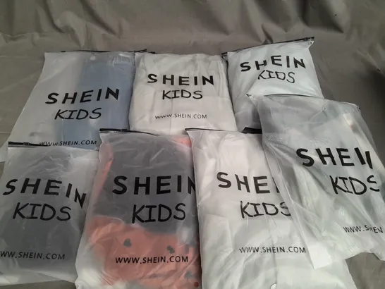 LOT OF APPROXIMATELY 20 BAGGED SHEIN KIDS CLOTHING ITEMS - VARIOUS SIZES