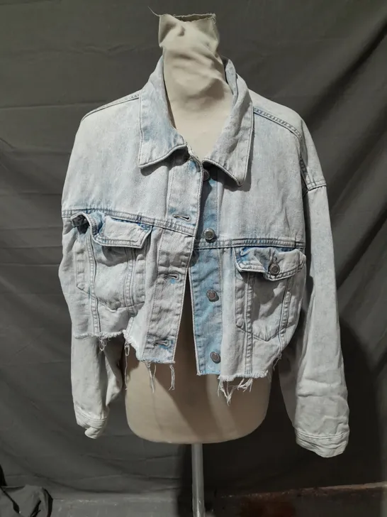 BERSHKA LONG SLEEVE RIPPED DENIM JACKET IN LIGHT BLUE SIZE MEDIUM