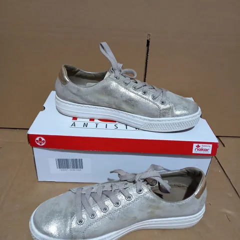 BOXED PAIR OF RIEKER GOLD METALLIC TRAINERS - SIZE 6.5