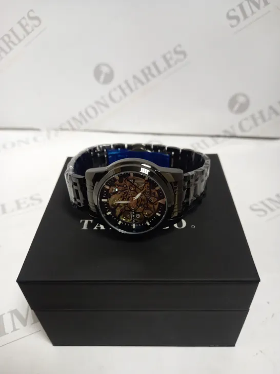 MEN’S TALIS CO 7820 AUTOMATIC WATCH – BLACK SKELETON DIAL AND CASE – STAINLESS STEEL STRAP – GLASS BACKCASE.