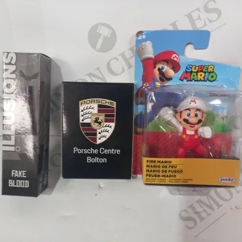 LOT OF APPROXIMATELY 10 ASSORTED TOYS AND GAMES TO INCLUDE SUPER MARIO FIRE MARIO FIGURE, PORSCHE PLAYING CARDS, FAKE BLOOD, ETC