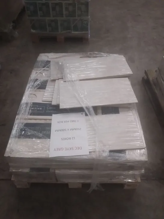 PALLET OF APPROXIMATELY 12 BOXES OF DEFINITIVE DEC SKYE GREY CERAMIC WALL TILES 250MM X 500MM APPROXIMATELY 1.5MSQ PER BOX
