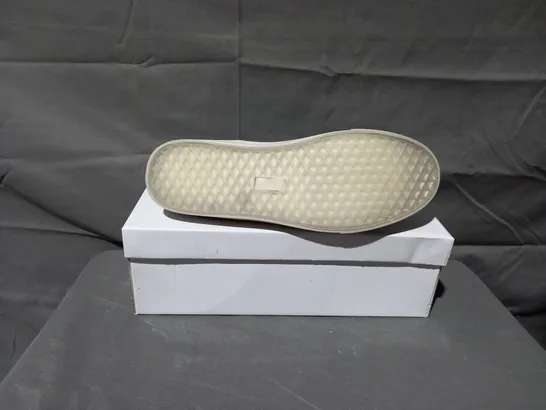 APPROXIMATELY 12 BOXED PAIRS OF W.S SLIP ON BLUE FLAT TRAINERS IN VARIOUS SIZES TO INCLUDE SIZES 38, 39, 40 