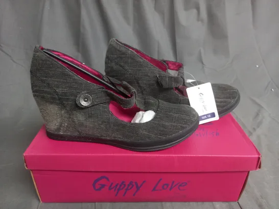 BOX OF APPROXIMATELY 12 BLACK  GUPPY LOVE BY BLOWFISH SHOES IN VARIOUS SIZES 