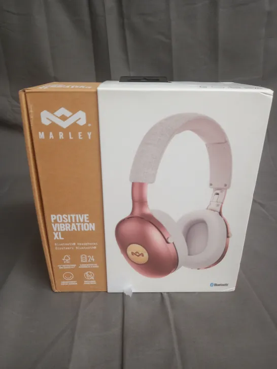 BOXED MARLEY POSITIVE VIBRATION XL BLUETOOTH HEADPHONES IN PINK/WHITE
