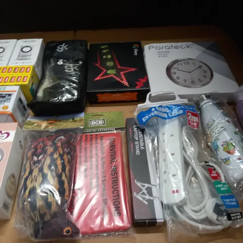 LARGE QUANTITY OF ASSORTED HOUSEHOLD ITEMS TO INCLUDE WALL CLOCK, SURVIVAL BLANKET, DOG TOYS AND GARDEN SOLAR LIGHTS