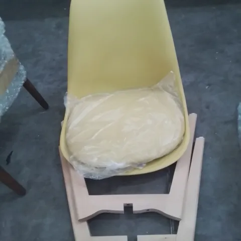 A YELLOW HARD BACK UPHOLSTERED SEAT SIDE CHAIR