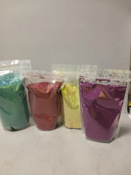 approximately 10 bags of glitter assorted colours