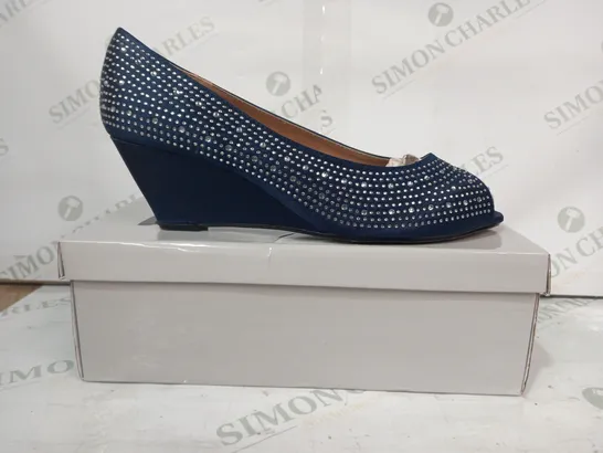 BOXED PAIR OF DIVINE WEDGE HEEL SLIP-ON SHOES IN NAVY W. JEWEL EFFECT SIZE 7