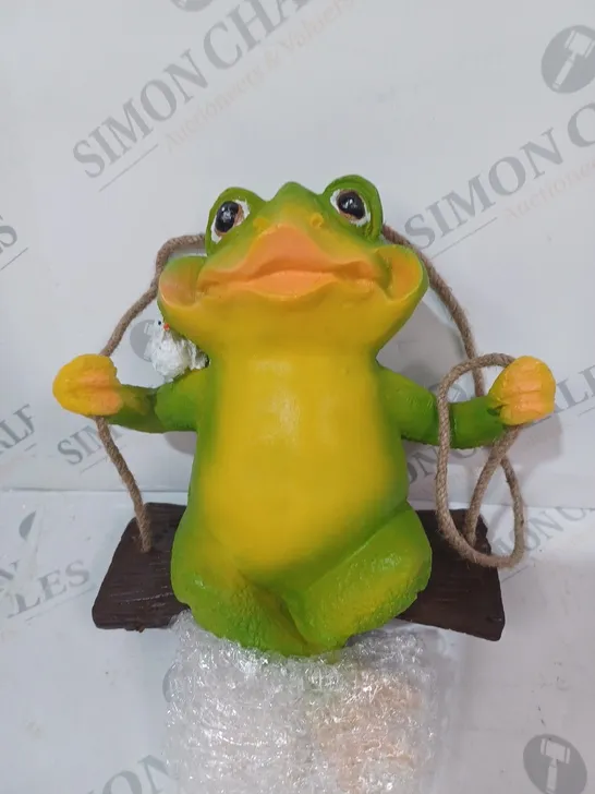 BOXED UNBRANDED DECORATIVE FROG ON A SWING