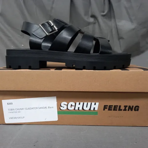 BOXED PAIR OF SCHUH TOBIN CHUNKY GLADIATOR SANDALS IN BLACK SIZE 6