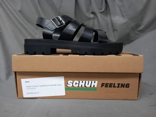 BOXED PAIR OF SCHUH TOBIN CHUNKY GLADIATOR SANDALS IN BLACK SIZE 6