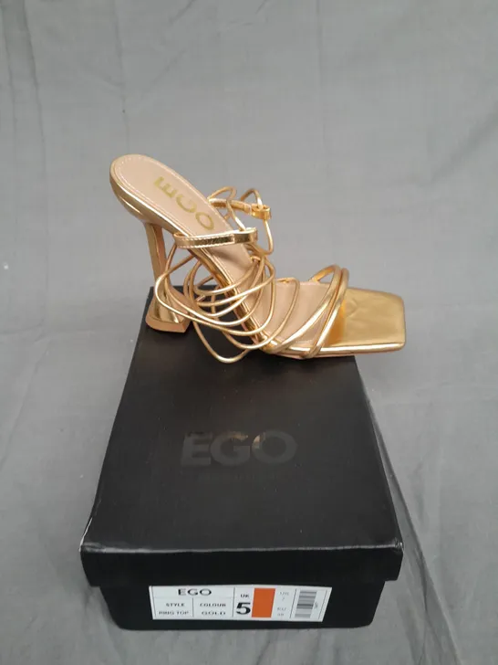 BOXED PAIR OF EGO GOLD HEEL RING TOP SIZE UK 5