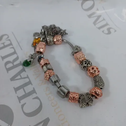 CLEAR CRYSTAL CHARM BRACELET & ASSORTED CHARMS 