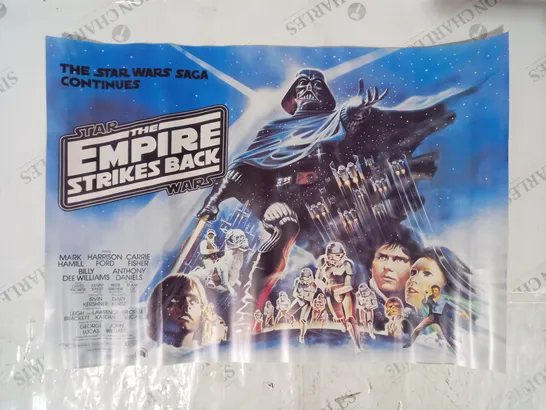 COLLECTION OF 2 FILM POSTER ART PRINTS TO INCLUDE LIVE AND LET DIE, AND THE EMPIRE STRIKES BACK