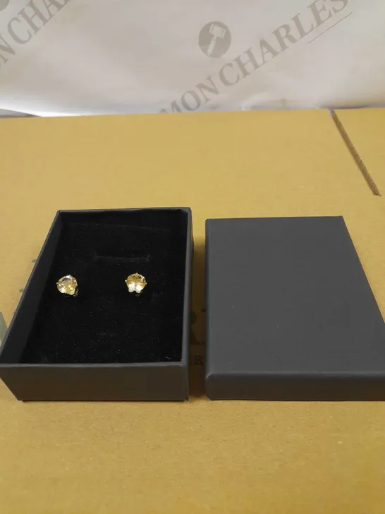 DESIGNER YELLOW STONE STUD EARRINGS 