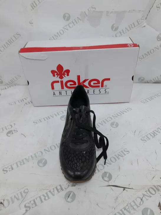 BOXED PAIR OF RIEKER LOW WEDGE TRAINERS IN BLACK SIZE 6