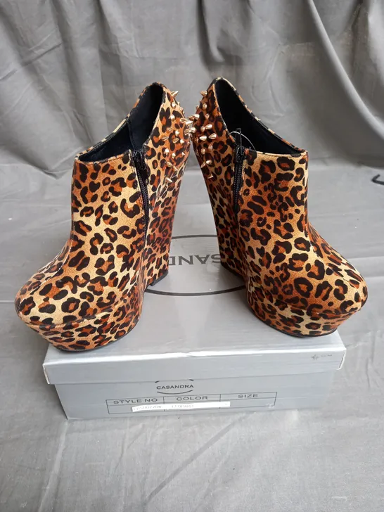 BOX OF 8 PAIRS OF CASSANDRA WEDGE ANKLE BOOTS IN LEOPARD WITH GOLD SPIKES - VARIOUS SIZES