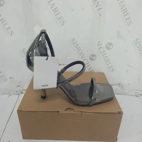 BOXED PAIR OF MNG SILVER SANDALS SIZE 4