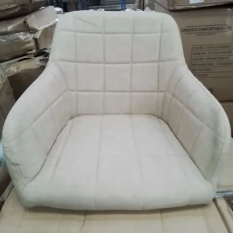 A BOXED PAIR OF CREAM FAUX LEATHER UPHOLSTERED SIDE CHAIRS