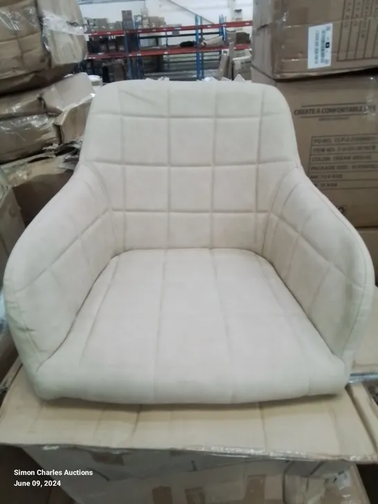 A BOXED PAIR OF CREAM FAUX LEATHER UPHOLSTERED SIDE CHAIRS