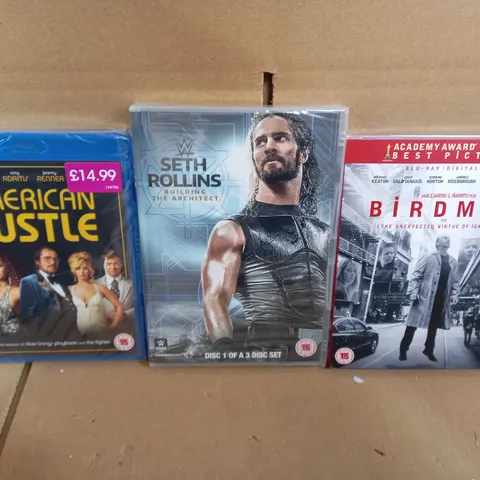 LOT OF APPROXIMATELY 65 SEALED DVDS/BLURAY DISCS TO INCLUDE AMERICAN HUSTLE, BIRDMAN AND SETH ROLLINS