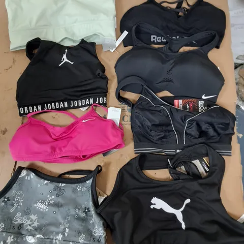 APPROXIMATELY 12 ASSORTED PIECES OF FEMALE GYM WEAR TO INCLUDE SPORTS BRAS IN VARIOUS SIZES AND STYLES 